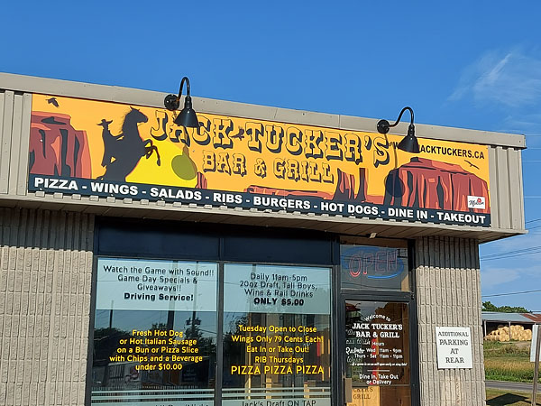 Business Sign Tuckers Bar & Grill